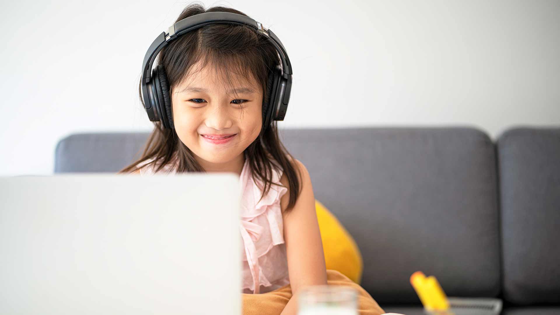 A relaxed child learning English online